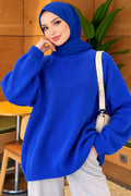 Túnica de punto oversize con hombros caídos Saks
