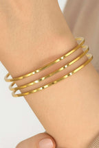 https://cdn.pazarium.com.tr/65-mm-3lu-ajda-bilezik-gold-678960-16-B.jpg