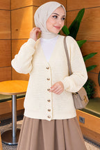 https://cdn.pazarium.com.tr/ajur-desenli-v-yaka-triko-hirka-ekru-838824-20-B.jpg