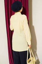 https://cdn.pazarium.com.tr/asimetrik-gold-toka-detayli-gomlek-sari-811761-20-B.jpg