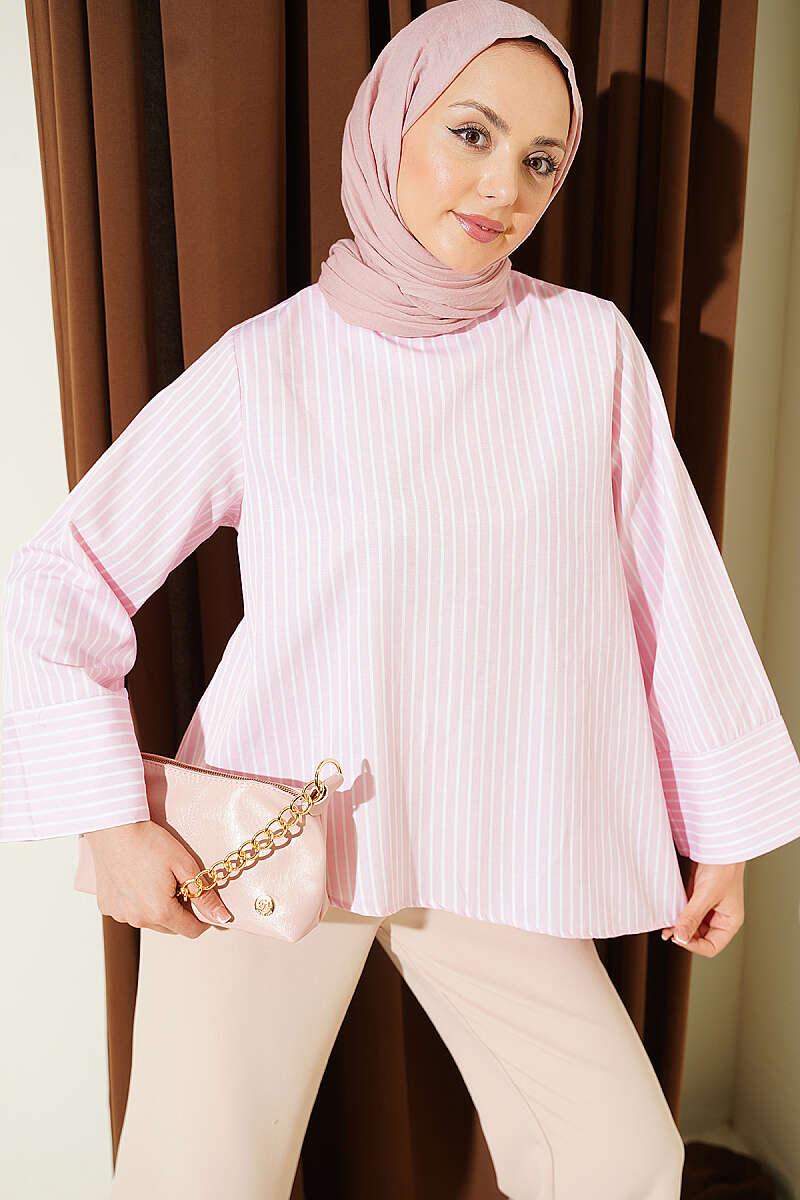 https://cdn.pazarium.com.tr/asimetrik-kesim-kalin-cizgili-tunik-pembe-796875-19-B.jpg