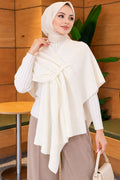 Poncho de punto con corte asimétrico crudo