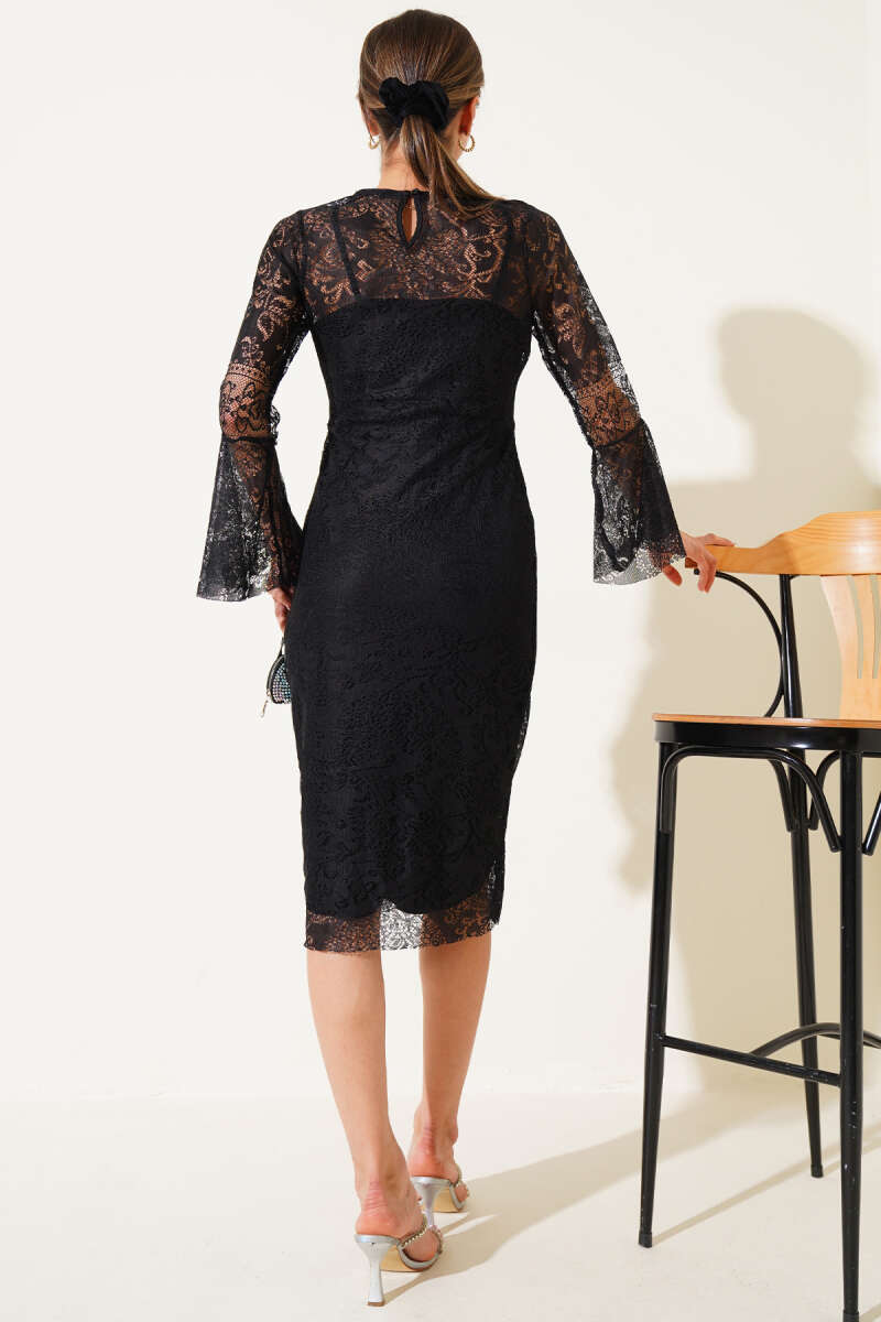 https://cdn.pazarium.com.tr/astarli-tul-elbise-siyah-628585-15-B.jpg