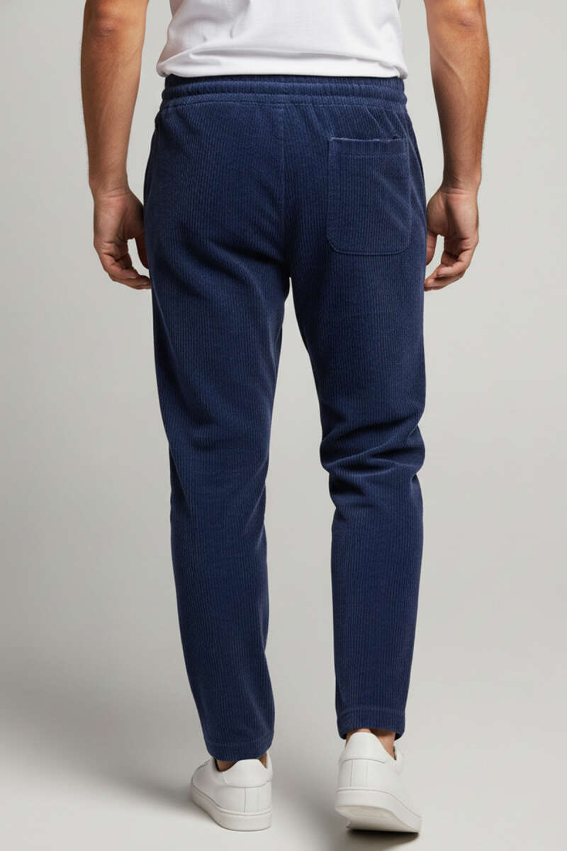 https://cdn.pazarium.com.tr/baggy-bagcikli-kadife-erkek-pantolon-indigo-701956-17-B.jpg
