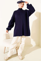 https://cdn.pazarium.com.tr/balikci-yaka-balon-kol-triko-tunik-lacivert-710495-17-B.jpg