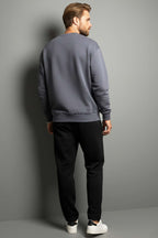 https://cdn.pazarium.com.tr/basic-bisiklet-yaka-erkek-sweatshirt-fume-699950-16-B.jpg