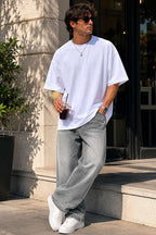 https://cdn.pazarium.com.tr/basic-bisiklet-yaka-oversize-erkek-t-shirt-beyaz-786650-19-B.jpg