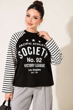 https://cdn.pazarium.com.tr/baskili-cizgi-detayli-sweatshirt-siyah-842321-20-B.jpg