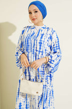 https://cdn.pazarium.com.tr/batik-desen-hakim-yaka-elbise-saks-798525-19-B.jpg