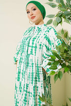 https://cdn.pazarium.com.tr/batik-desen-hakim-yaka-elbise-yesil-798518-19-B.jpg