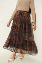 https://cdn.pazarium.com.tr/batik-desen-katli-sifon-etek-hardal-760625-18-B.jpg