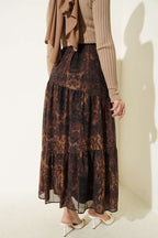 https://cdn.pazarium.com.tr/batik-desen-katli-sifon-etek-hardal-760627-18-B.jpg