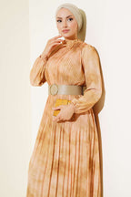 https://cdn.pazarium.com.tr/batik-desen-pileli-sifon-elbise-yag-yesili-524369-12-B.jpg