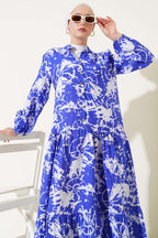 https://cdn.pazarium.com.tr/batik-desen-yarim-dugmeli-elbise-saks-585619-14-B.jpg