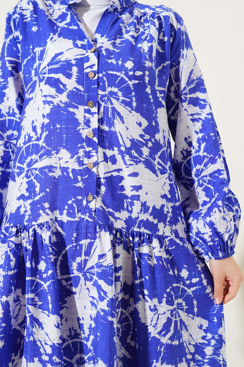 https://cdn.pazarium.com.tr/batik-desen-yarim-dugmeli-elbise-saks-585620-14-B.jpg