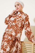 https://cdn.pazarium.com.tr/batik-desen-yarim-dugmeli-elbise-taba-585615-14-B.jpg