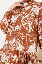 https://cdn.pazarium.com.tr/batik-desen-yarim-dugmeli-elbise-taba-585616-14-B.jpg