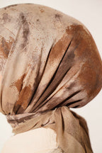 https://cdn.pazarium.com.tr/batik-desenli-soft-esarp-latte-813719-20-B.jpg