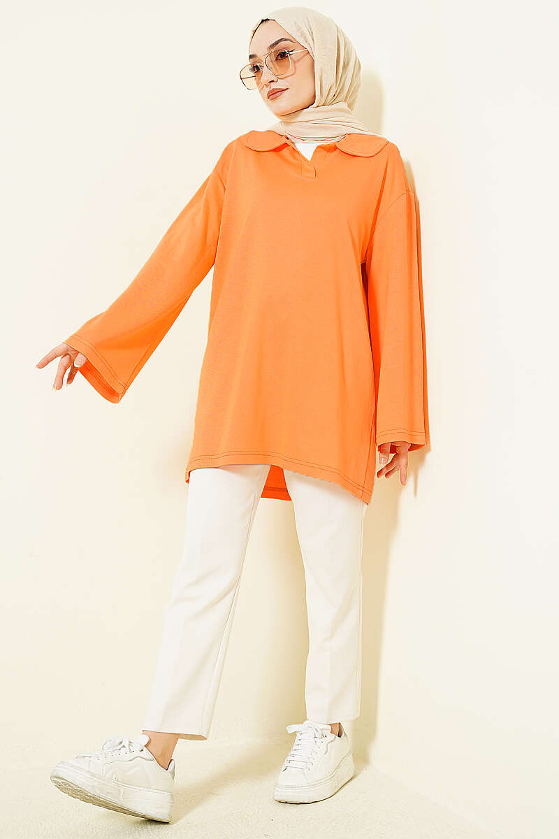 https://cdn.pazarium.com.tr/bebe-yaka-detayli-tunik-oranj-766128-18-B.jpg