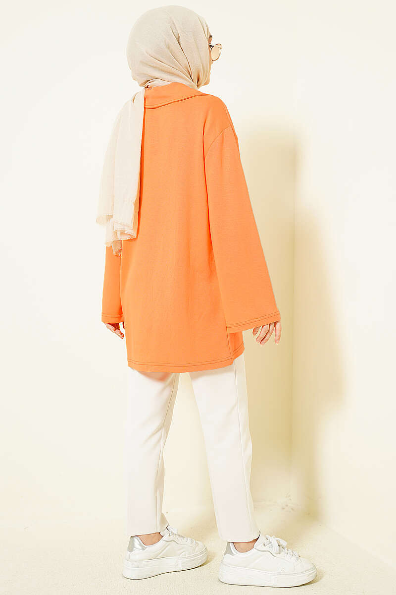 https://cdn.pazarium.com.tr/bebe-yaka-detayli-tunik-oranj-766129-18-B.jpg