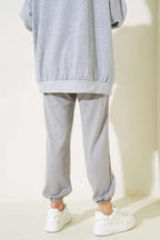 https://cdn.pazarium.com.tr/bel-ipli-paca-lastikli-jogger-pantolon-gri-548353-13-B.jpg