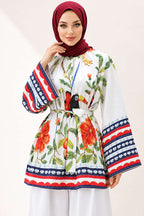 https://cdn.pazarium.com.tr/bel-kusakli-cicek-desenli-tunik-ekru-812341-20-B.jpg
