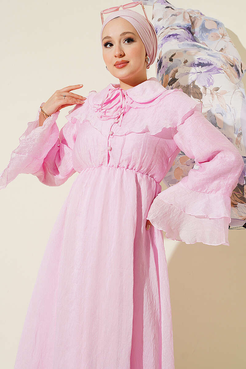 https://cdn.pazarium.com.tr/bel-lastik-detayli-pelerinli-elbise-pembe-807825-19-B.jpg