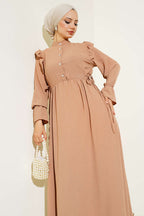 https://cdn.pazarium.com.tr/bel-lastikli-ayrobin-elbise-camel-521260-12-B.jpg