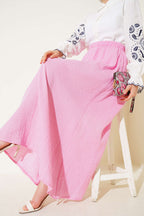 https://cdn.pazarium.com.tr/bel-lastikli-muslin-etek-pembe-656435-15-B.jpg