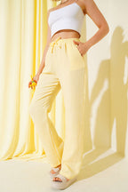 https://cdn.pazarium.com.tr/bel-lastikli-muslin-pantolon-sari-651554-15-B.jpg
