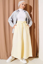 https://cdn.pazarium.com.tr/bel-lastikli-muslin-salas-pantolon-sari-808280-19-B.jpg