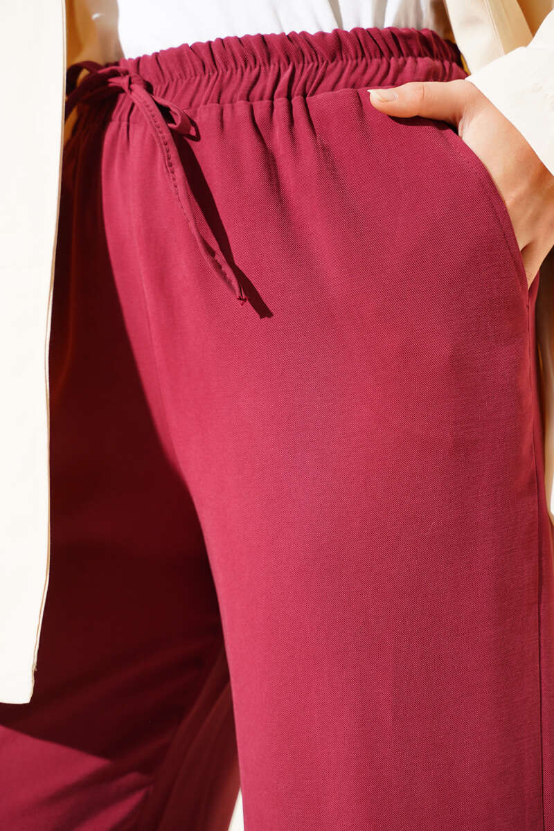 https://cdn.pazarium.com.tr/bel-lastikli-tencel-pantolon-bordo-682269-16-B.jpg