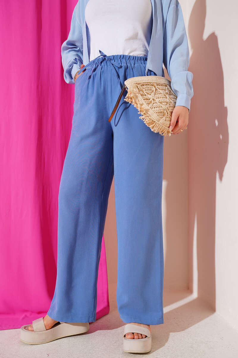 https://cdn.pazarium.com.tr/bel-lastikli-tencel-pantolon-indigo-640355-15-B.jpg