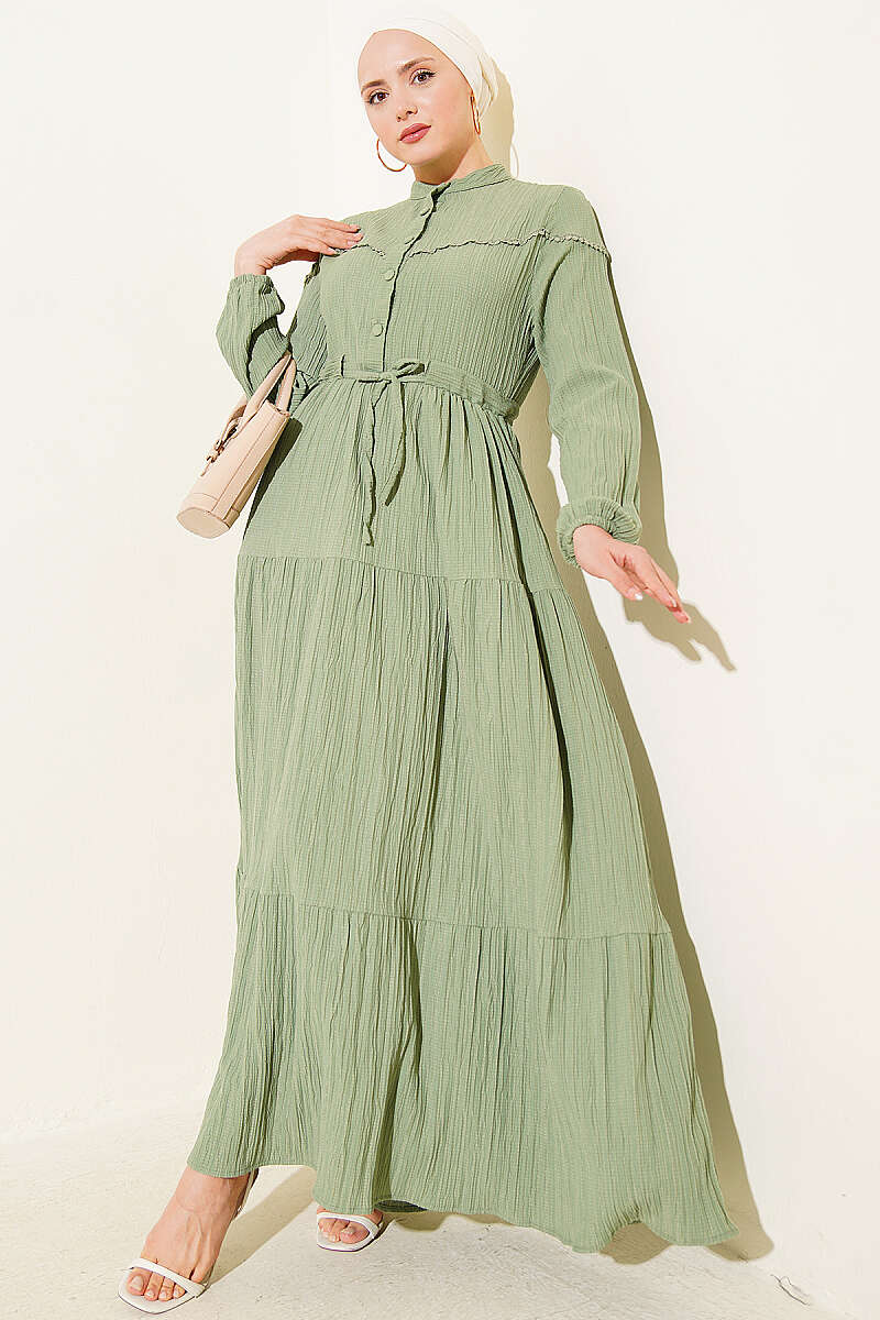 https://cdn.pazarium.com.tr/bel-tunelli-dugmeli-agac-kabugu-elbise-haki-772777-18-B.jpg