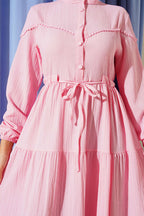 https://cdn.pazarium.com.tr/bel-tunelli-dugmeli-agac-kabugu-elbise-pembe-664818-16-B.jpg