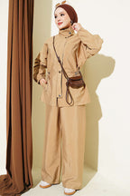 https://cdn.pazarium.com.tr/bel-tunelli-fermuarli-ikili-takim-camel-821699-20-B.jpg