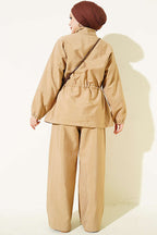 https://cdn.pazarium.com.tr/bel-tunelli-fermuarli-ikili-takim-camel-821701-20-B.jpg