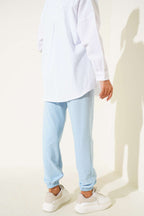 https://cdn.pazarium.com.tr/bel-ve-bilek-lastikli-jogger-pantolon-bebe-mavi-669633-16-B.jpg