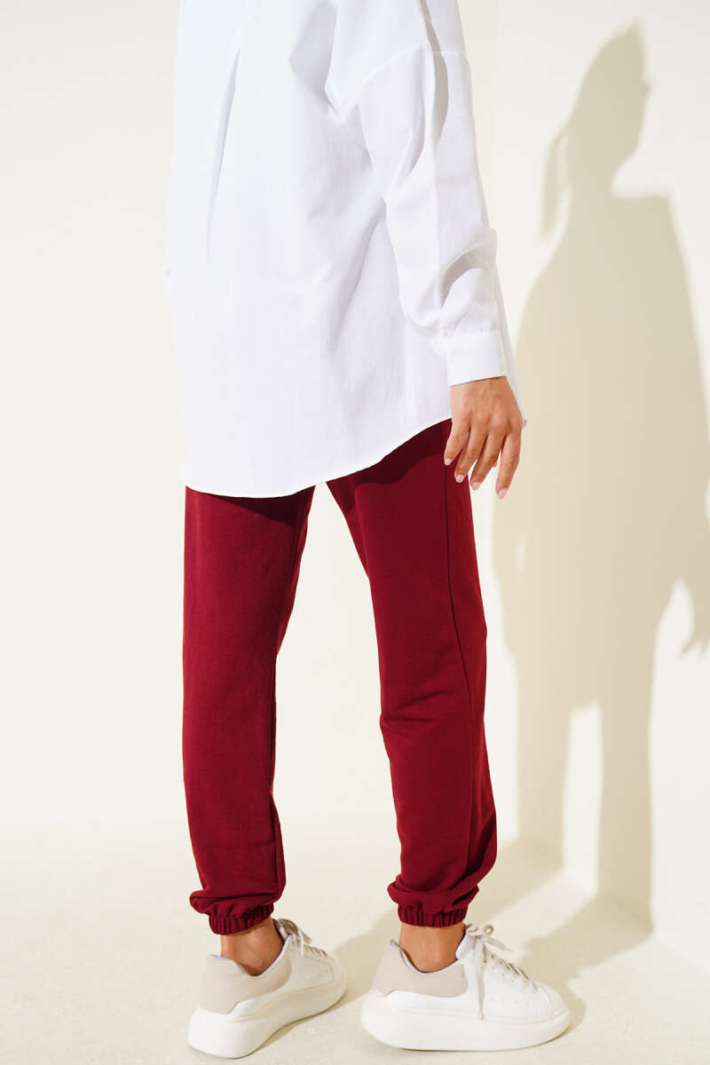 https://cdn.pazarium.com.tr/bel-ve-bilek-lastikli-jogger-pantolon-bordo-669629-16-B.jpg