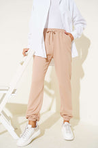 https://cdn.pazarium.com.tr/bel-ve-bilek-lastikli-jogger-pantolon-camel-669624-16-B.jpg
