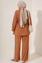 https://cdn.pazarium.com.tr/beli-lastikli-garnili-tensel-ikili-takim-camel-806867-19-B.jpg