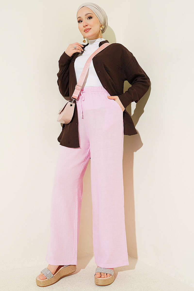 https://cdn.pazarium.com.tr/beli-lastikli-genis-paca-muslin-pantolon-pembe-778477-19-B.jpg