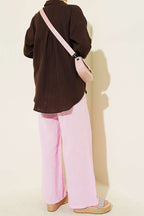 https://cdn.pazarium.com.tr/beli-lastikli-genis-paca-muslin-pantolon-pembe-778479-19-B.jpg
