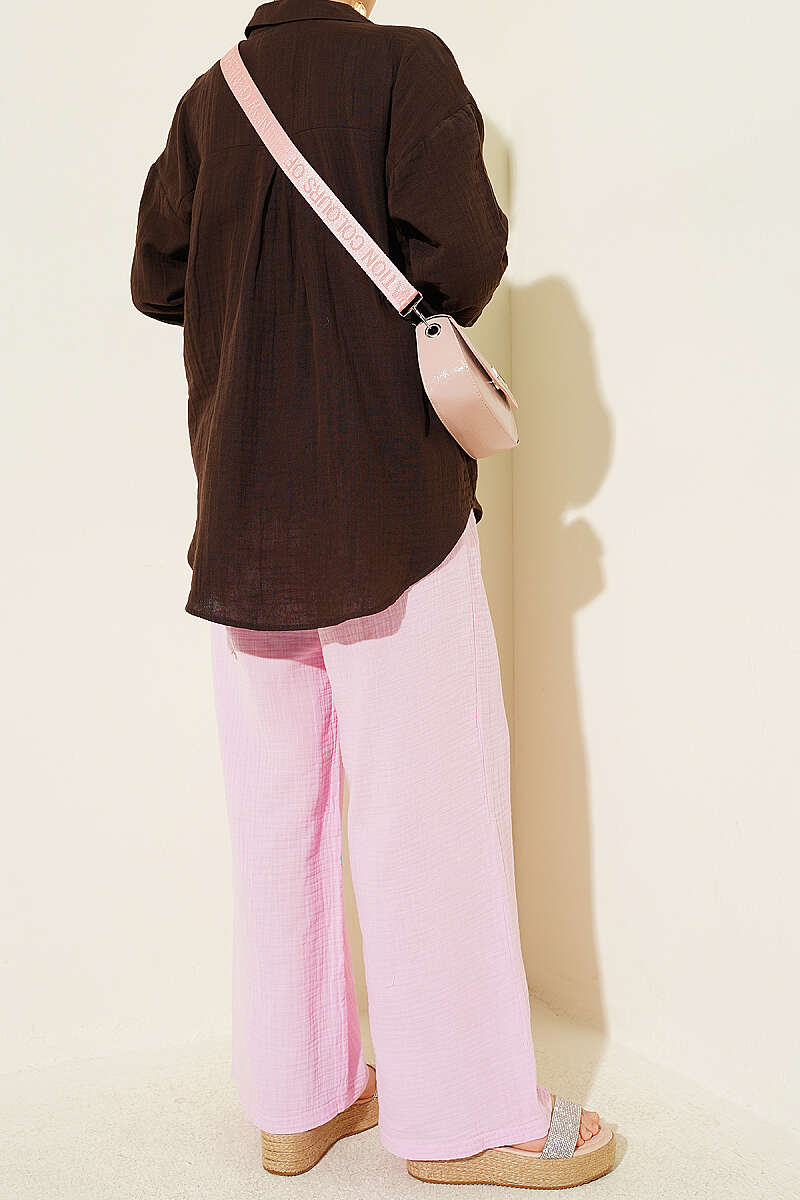 https://cdn.pazarium.com.tr/beli-lastikli-genis-paca-muslin-pantolon-pembe-778479-19-B.jpg