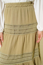 https://cdn.pazarium.com.tr/beli-lastikli-gupur-seritli-muslin-etek-cagla-yesili-745201-18-B.jpg