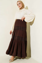 https://cdn.pazarium.com.tr/beli-lastikli-gupur-seritli-muslin-etek-kahve-745190-18-B.jpg