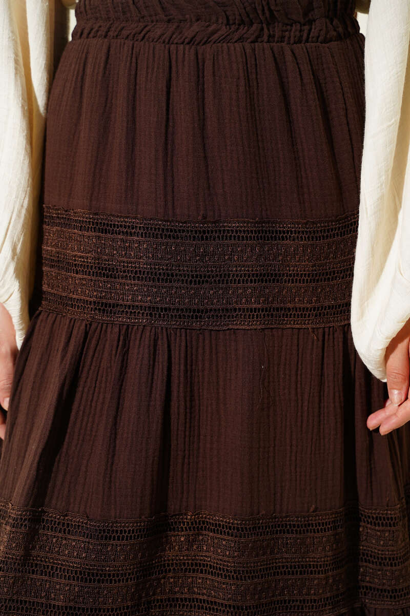 https://cdn.pazarium.com.tr/beli-lastikli-gupur-seritli-muslin-etek-kahve-745196-18-B.jpg