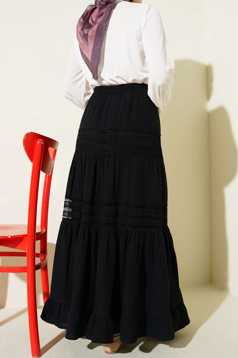 https://cdn.pazarium.com.tr/beli-lastikli-gupur-seritli-muslin-etek-siyah-745189-18-B.jpg