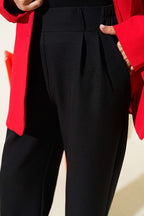 https://cdn.pazarium.com.tr/beli-lastikli-onu-pensli-pantolon-siyah-786433-19-B.jpg
