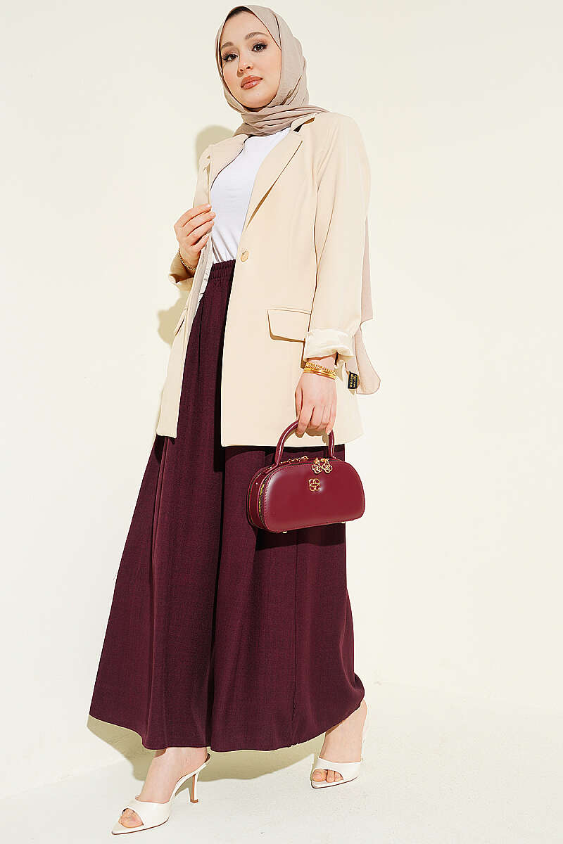https://cdn.pazarium.com.tr/beli-lastikli-oversize-pacali-pantolon-bordo-763875-18-B.jpg